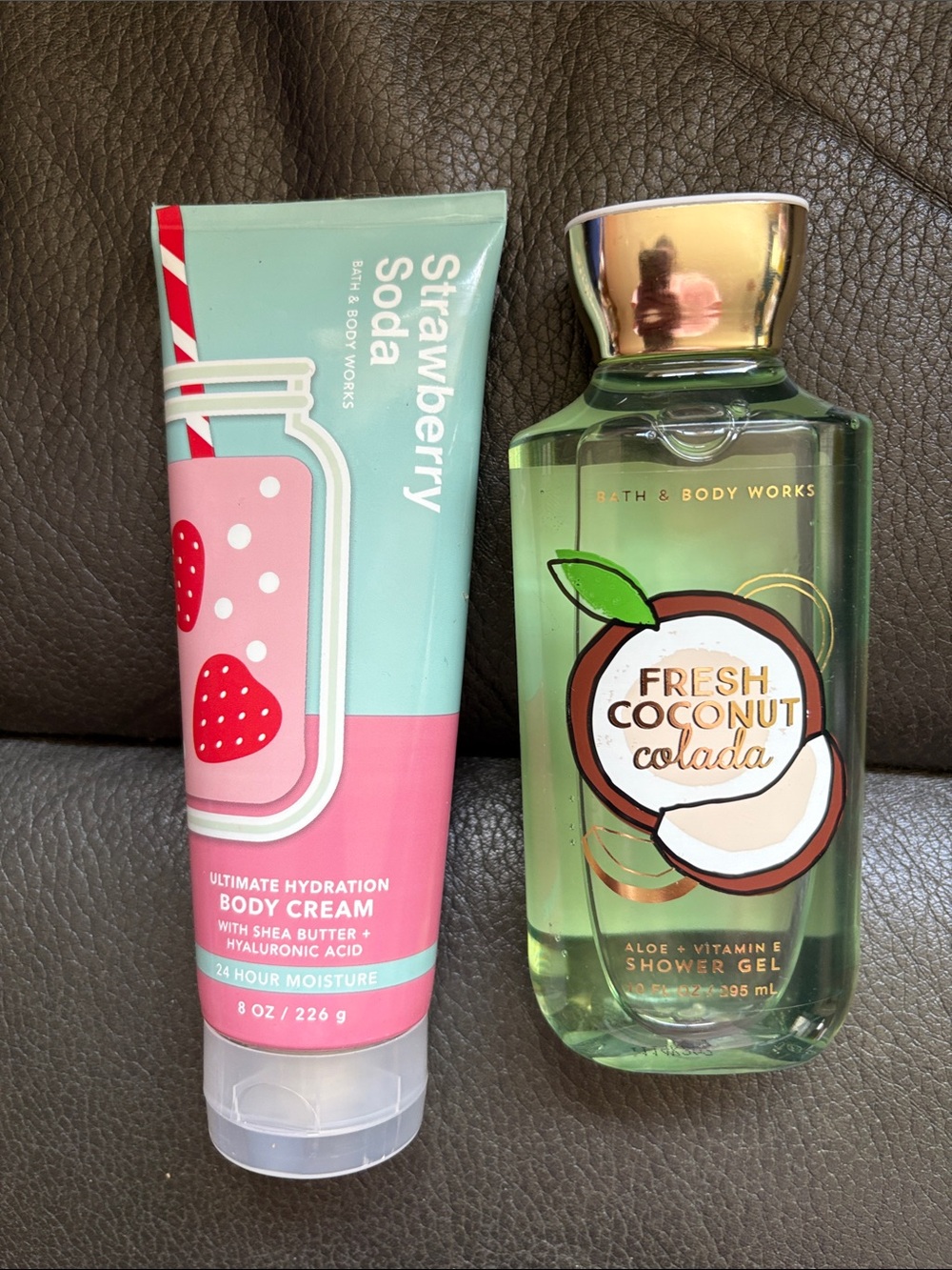 Bath and body works set in strawberry soda and fresh coconut colada